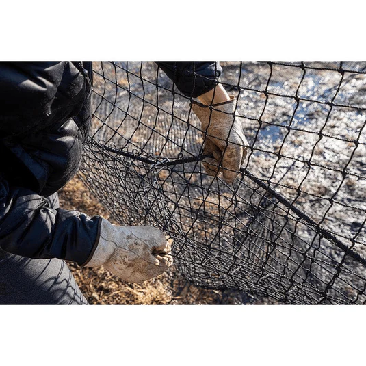 Setting up the Pig Brig net trap by hand
